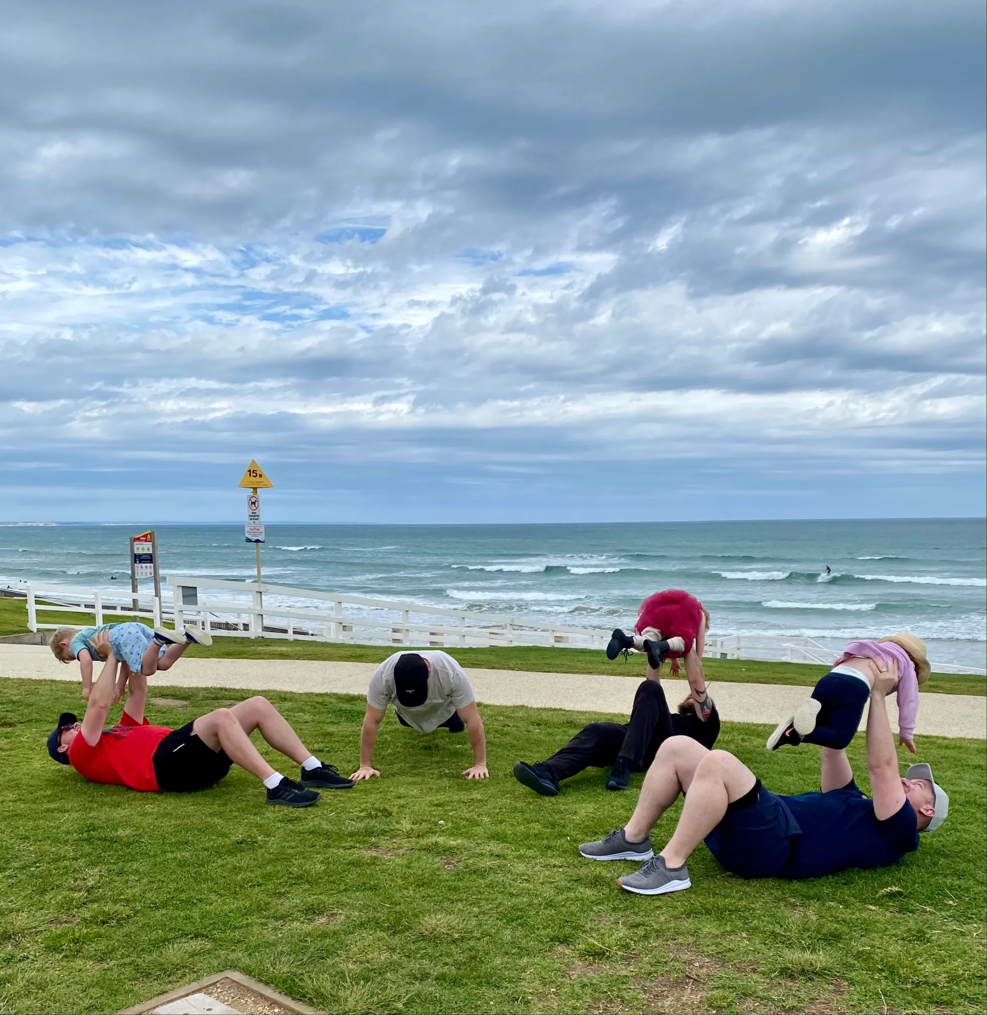 Dads exercising together outdoors